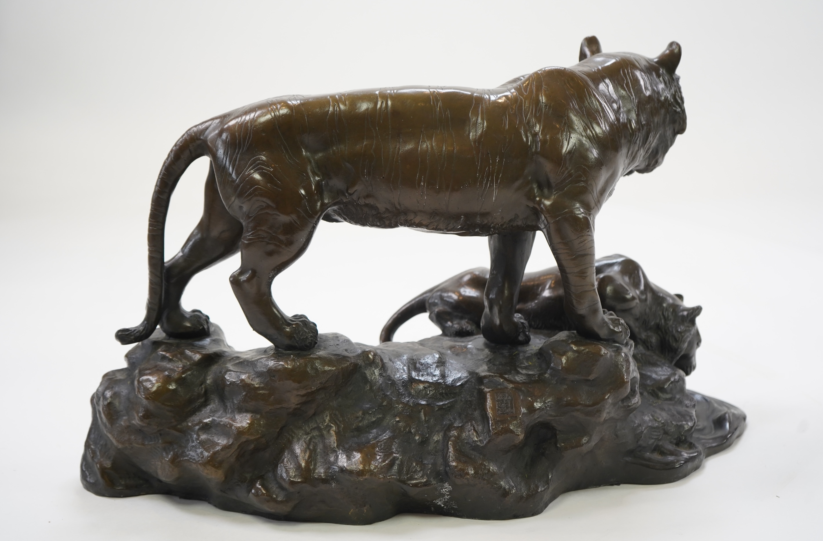 CHANGE TO DESCRIPTION- After Genryusai Seiya, a large patinated bronze group of two tigers on a riverbank